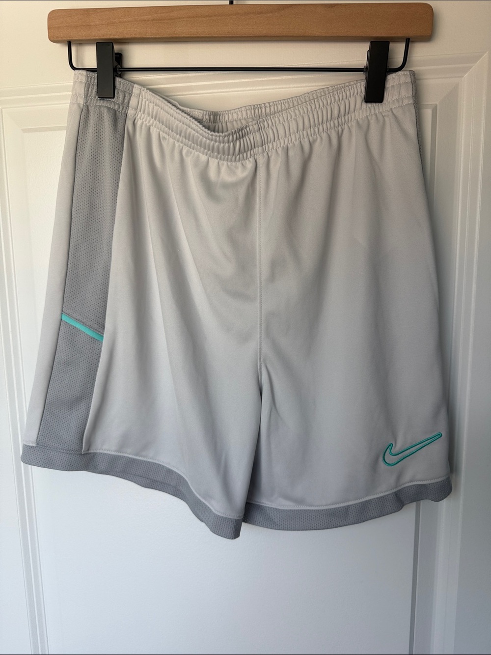 Nike Boys  Light Gray Athletic Shorts with Teal Swoosh Size XL